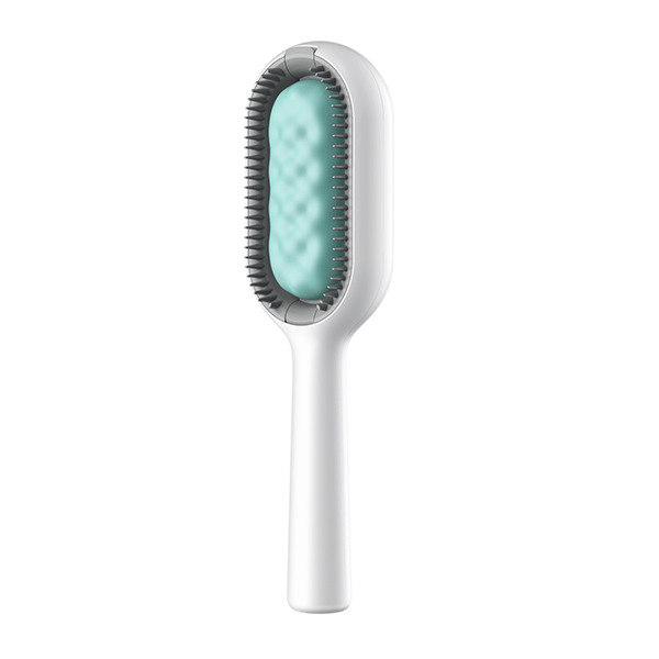 Detailansicht des 2-in-1 Haustierpflegekamms, ergonomisches Design für effektive Fellpflege von Hunden & Katzen.