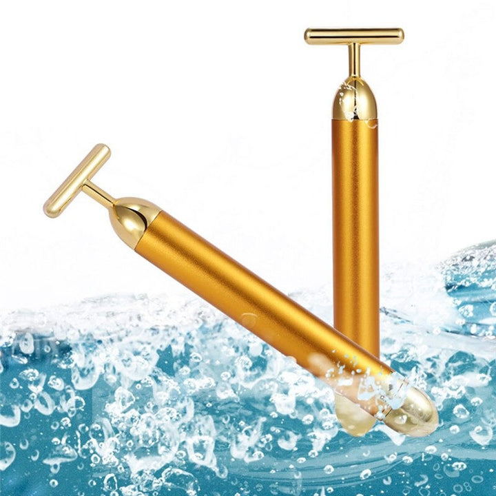 Luxuriöser Gold Gesichtsroller mit Vibrationsmassage für effektives Anti-Aging. Strafft die Haut sichtbar.