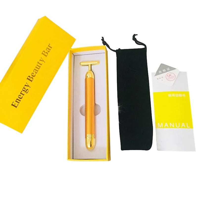 Innovativer Gold T-Bar Gesichtsroller mit Vibrationsfunktion. Perfekt für Anti-Aging & verbesserte Hautelastizität.