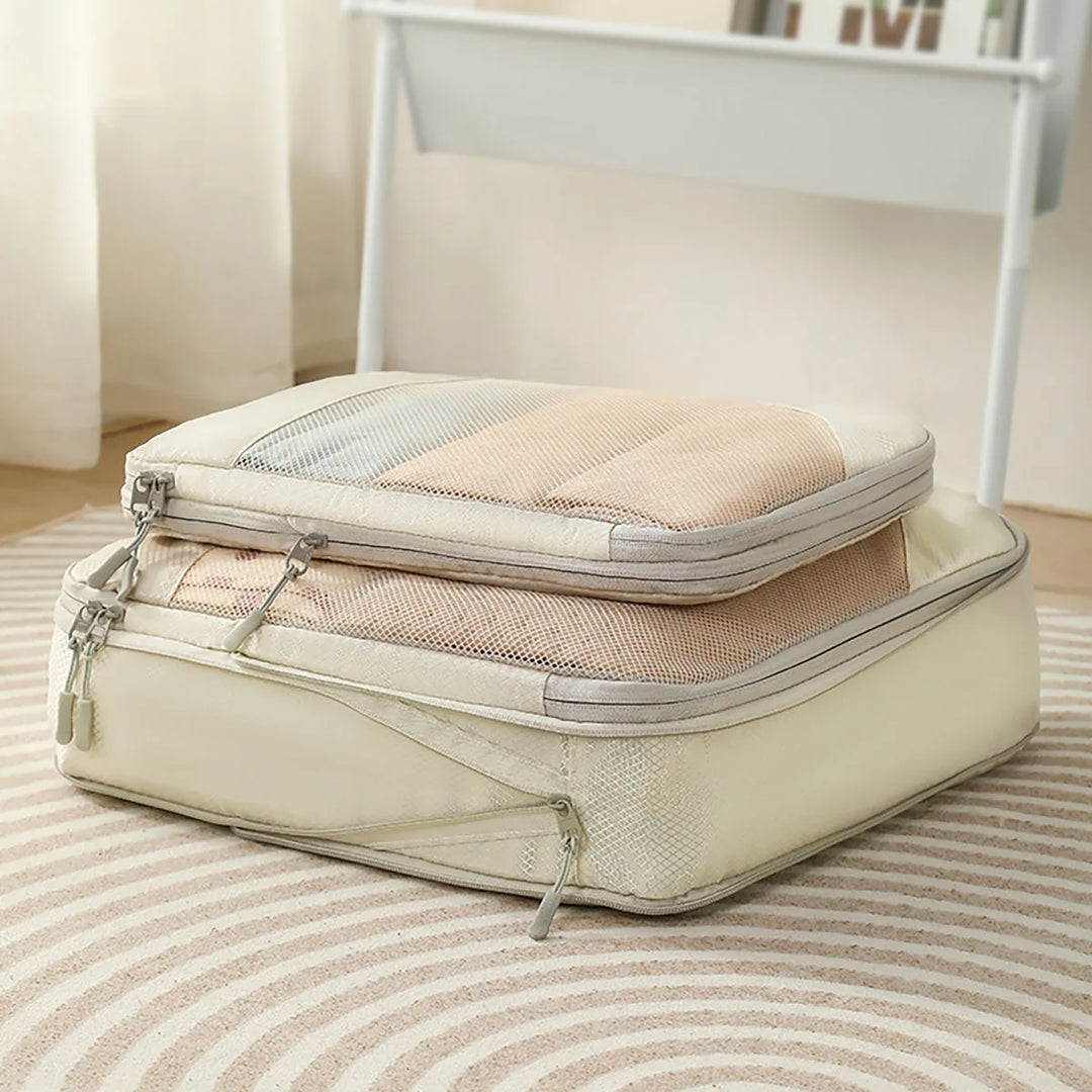 Wasserdichte Packwürfel und Kompressionsbeutel für organisierte Reiseutensilien; ideal für Rucksack & Trolley.