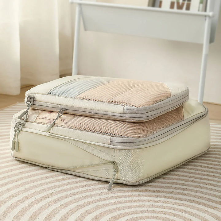 Wasserdichte Packwürfel und Kompressionsbeutel für organisierte Reiseutensilien; ideal für Rucksack & Trolley.
