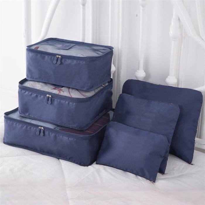 Kompakt faltbares Packwürfel Set aus Polyester, ideal für platzsparende Reisegepäck-Organisation und Ordnung.