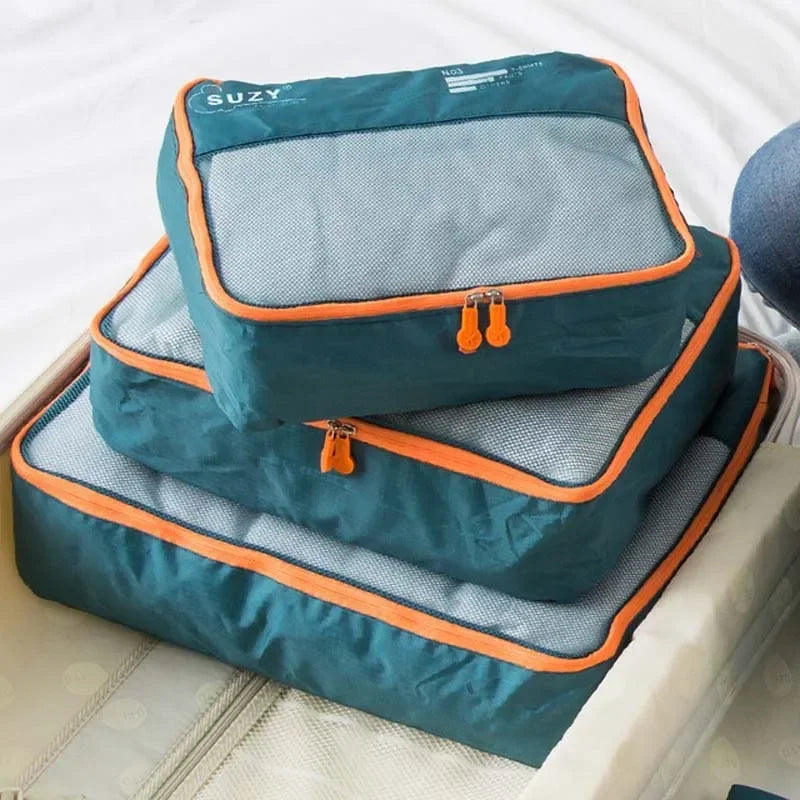 Platzsparende Reise-Organizer zum effizienten Packen von Kleidung & Schuhen im Koffer; 7-teiliges Gepäck-Set.