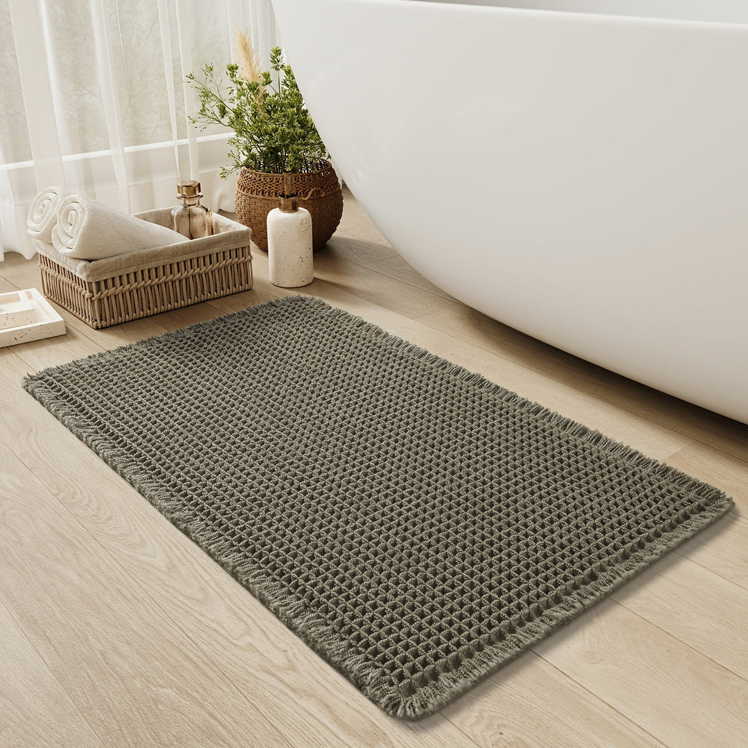 Waschbare, langlebige AquaSoft Badmatte mit moderner Waffeloptik; pflegeleicht & weich für Ihr Bad.