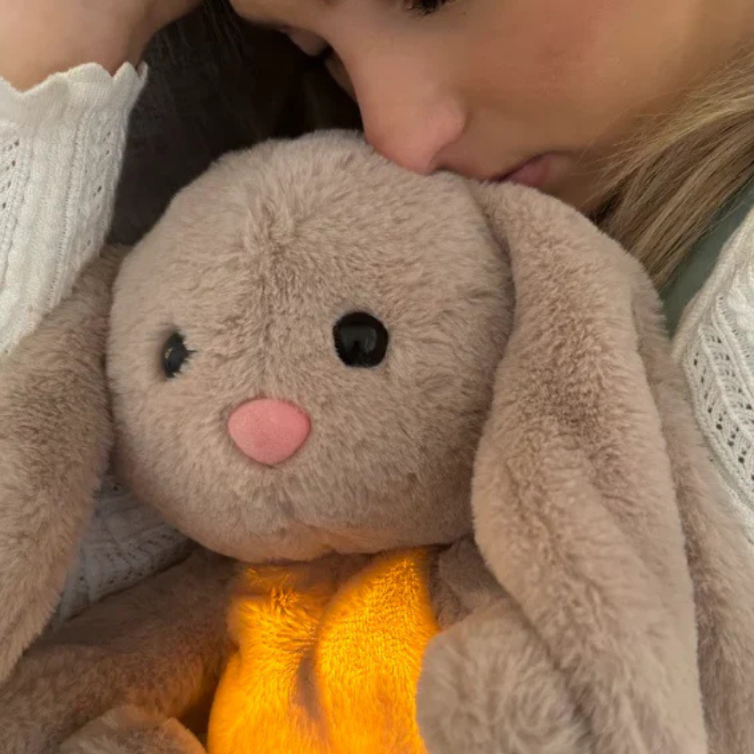 Beruhigendes Atmendes Kuscheltier SnuggleBreathe, mindert Angst und bietet Trost für Babys.