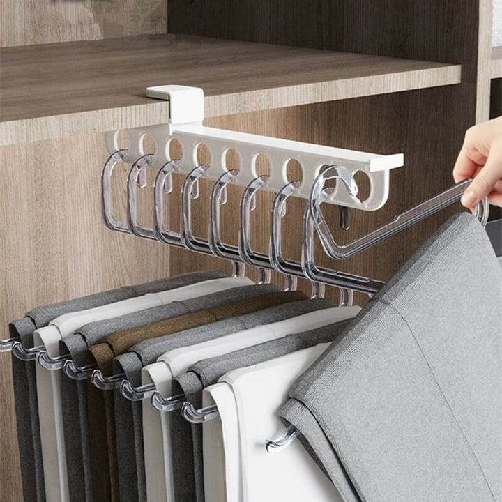 Ausziehbare Kleiderstange ohne Bohren für mehr Ordnung im Schrank; schafft sofortigen Stauraum als Schrank Organizer.