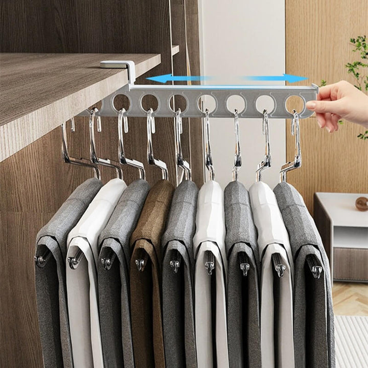Bohrfreie, ausziehbare Kleiderstange als Schrank Organizer; ideal zum Platzsparen in Garderobe und Schranksystem.