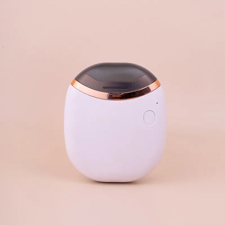 Eleganter, kompakter automatischer Nagelknipser; moderne elektrische Nagelpflege für Zuhause.