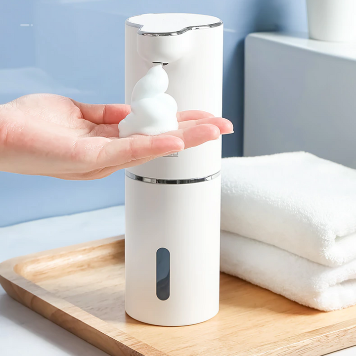 Automatischer Seifenspender zur Wandmontage, sorgt für berührungslose Sauberkeit und Hygiene.