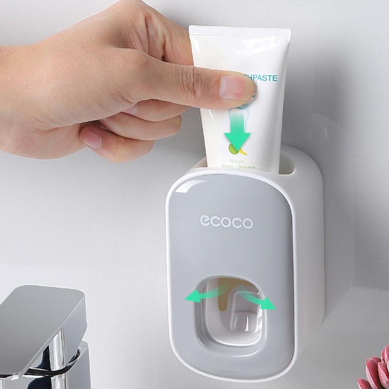 Wandmontierter Zahnpasta-Spender aus robustem Kunststoff, perfekt für modernes Badzubehör und Hygiene.