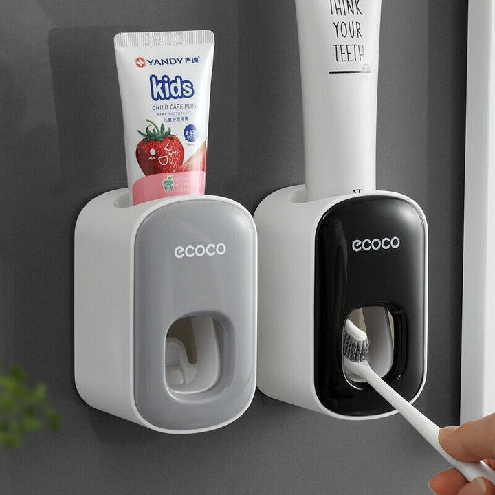 Eleganter, automatischer Zahnpasta-Spender als modernes Badzubehör für bequeme Mundhygiene.
