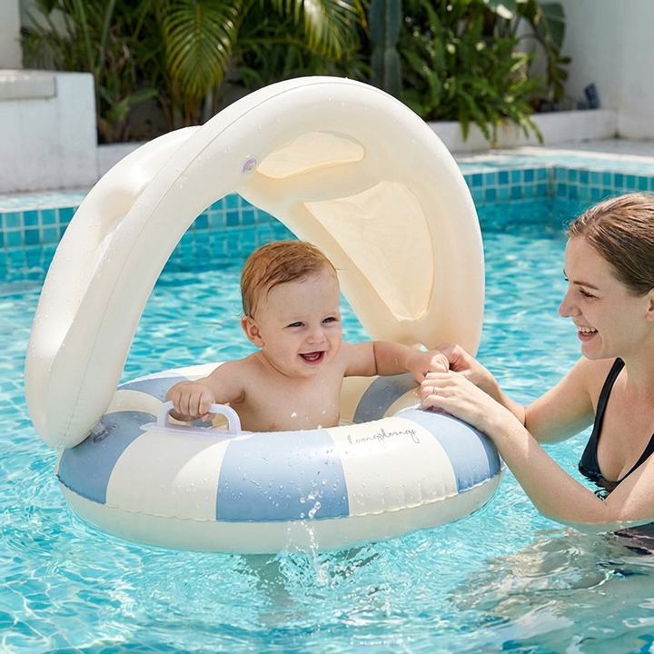 Baby-Schwimmring mit Sonnenschutz für entspanntes Schwimmenlernen. Retro Design Schwimmhilfe für Kleinkinder im Wasser.