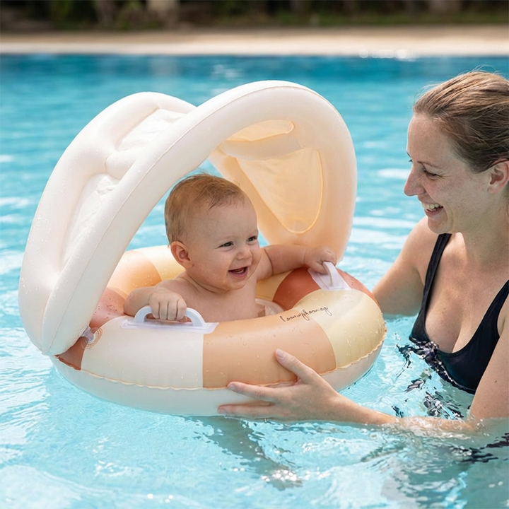 Baby-Schwimmhilfe im Retro-Stil mit Sonnenschutz. Dieser Schwimmring bietet Sicherheit und Spaß im Wasser für Babys.