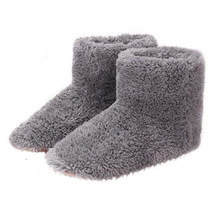 Ein Paar gemütliche beheizbare Hausschuhe (USB), perfekt für Damen & Herren, um kalten Füßen im Herbst/Winter vorzubeugen.