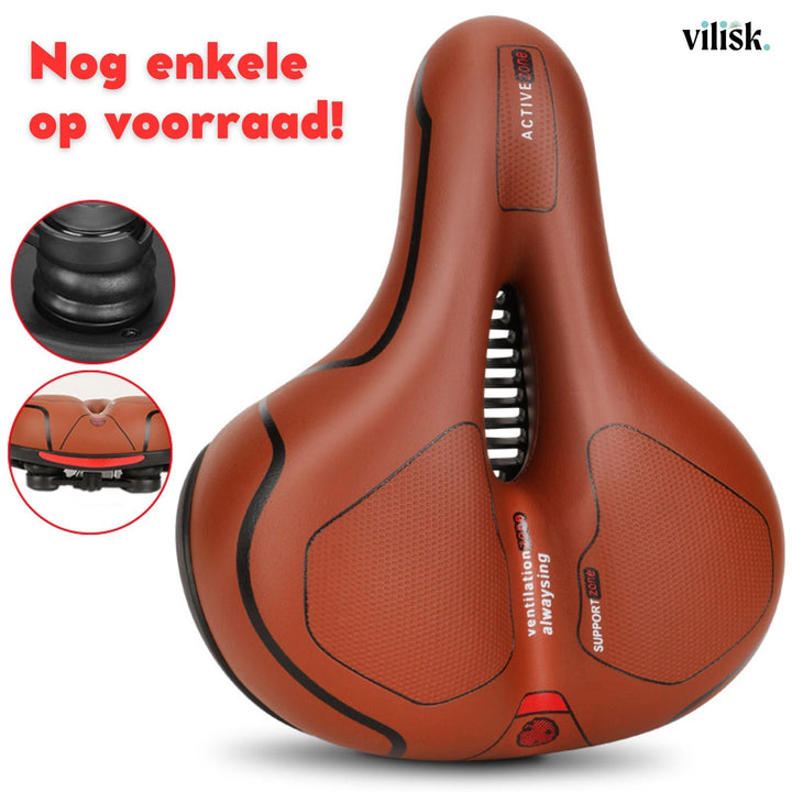 Seitenansicht: Ergonomischer Fahrradsattel mit Belüftungskanal, Polsterung & Stoßdämpfung für Komfort.