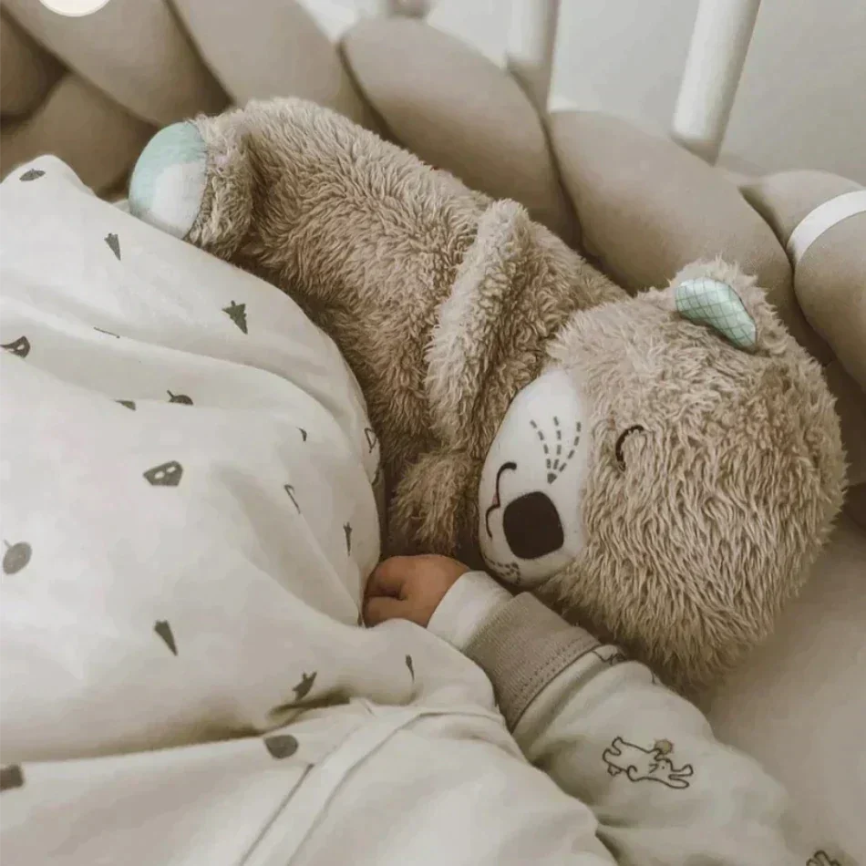 Niedliches Kuscheltier Baby mit sanften Melodien & beruhigenden Geräuschen, ein weiches Plüschtier für Entspannung.