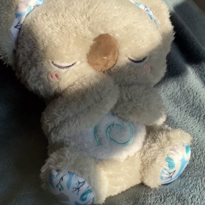 Sanft atmender Koala: Sensorisches Spielzeug & Schlafhilfe speziell für Babys. Fördert Ruhe & Einschlafen.