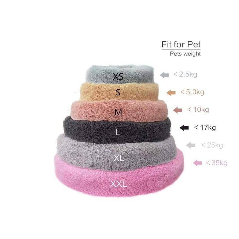 Kuscheliges Donut Hundebett in beruhigender Form, ideal für kleine & große Hunde.
