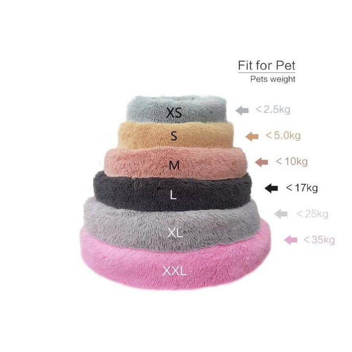 Kuscheliges Donut Hundebett in beruhigender Form, ideal für kleine & große Hunde.