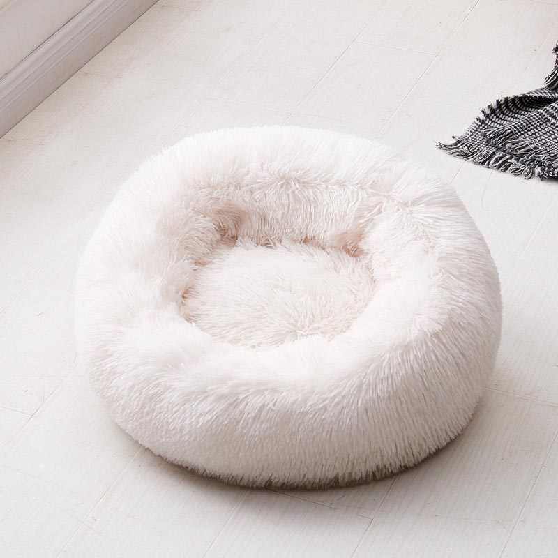 Extra weiches Donut Haustierbett aus Plüsch, ideal für empfindliche Gelenke.