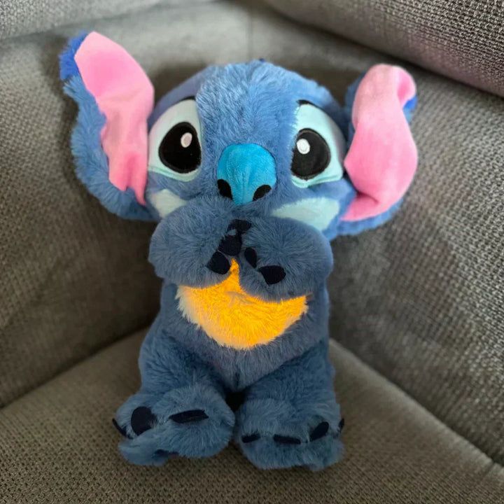 Blaues DreamiHug Kuscheltier mit beruhigender Atemfunktion, sanfte Einschlafhilfe für Kinder.