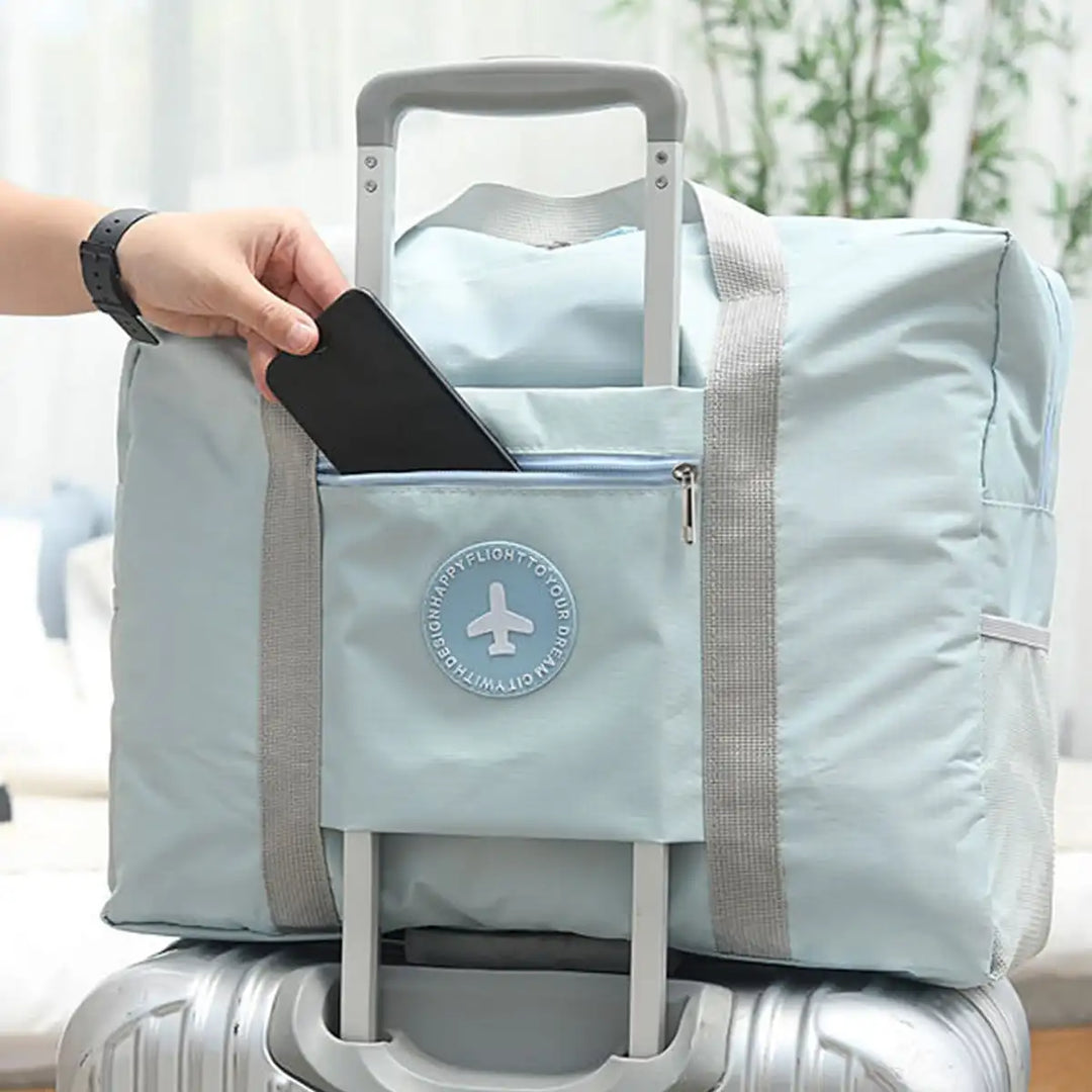 Beige faltbare Reisetasche für Unisex, trolley-kompatibel. Praktische Aufbewahrungstasche aus Polyester für Kurztrips.