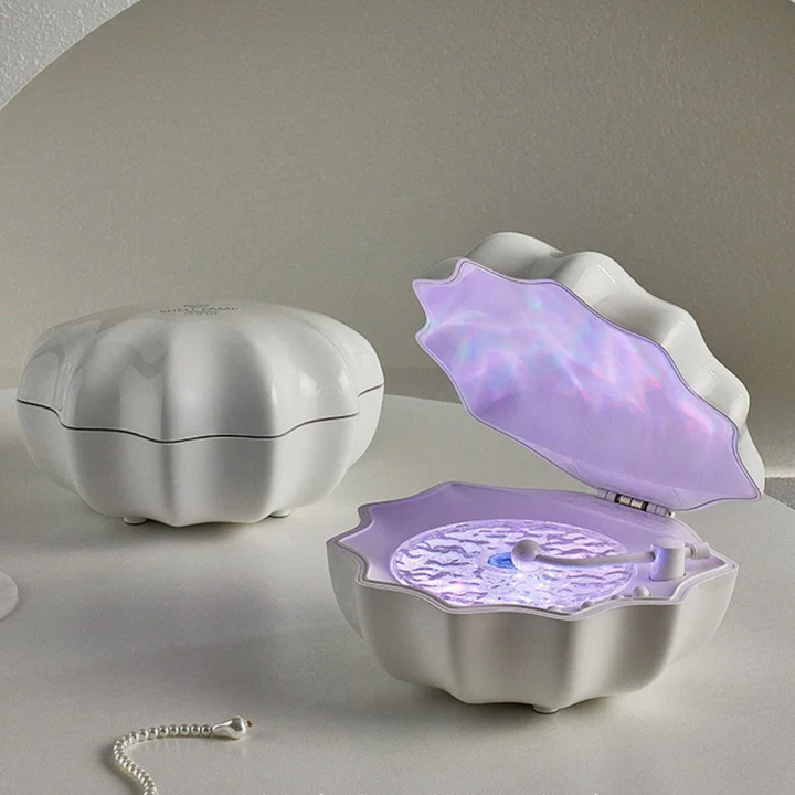 Kreiert entspannende Atmosphäre: Bluetooth Lautsprecher mit dynamischer Wellenlicht-Projektion, kabellos.
