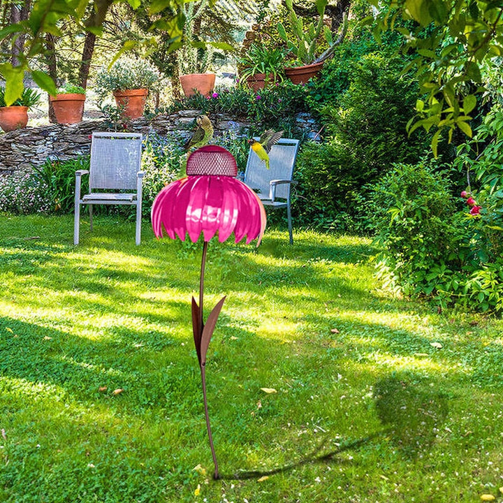 Einzigartiges Vogelhaus mit blumigem Design, perfekt für Vogelfutter und Gartendekoration.