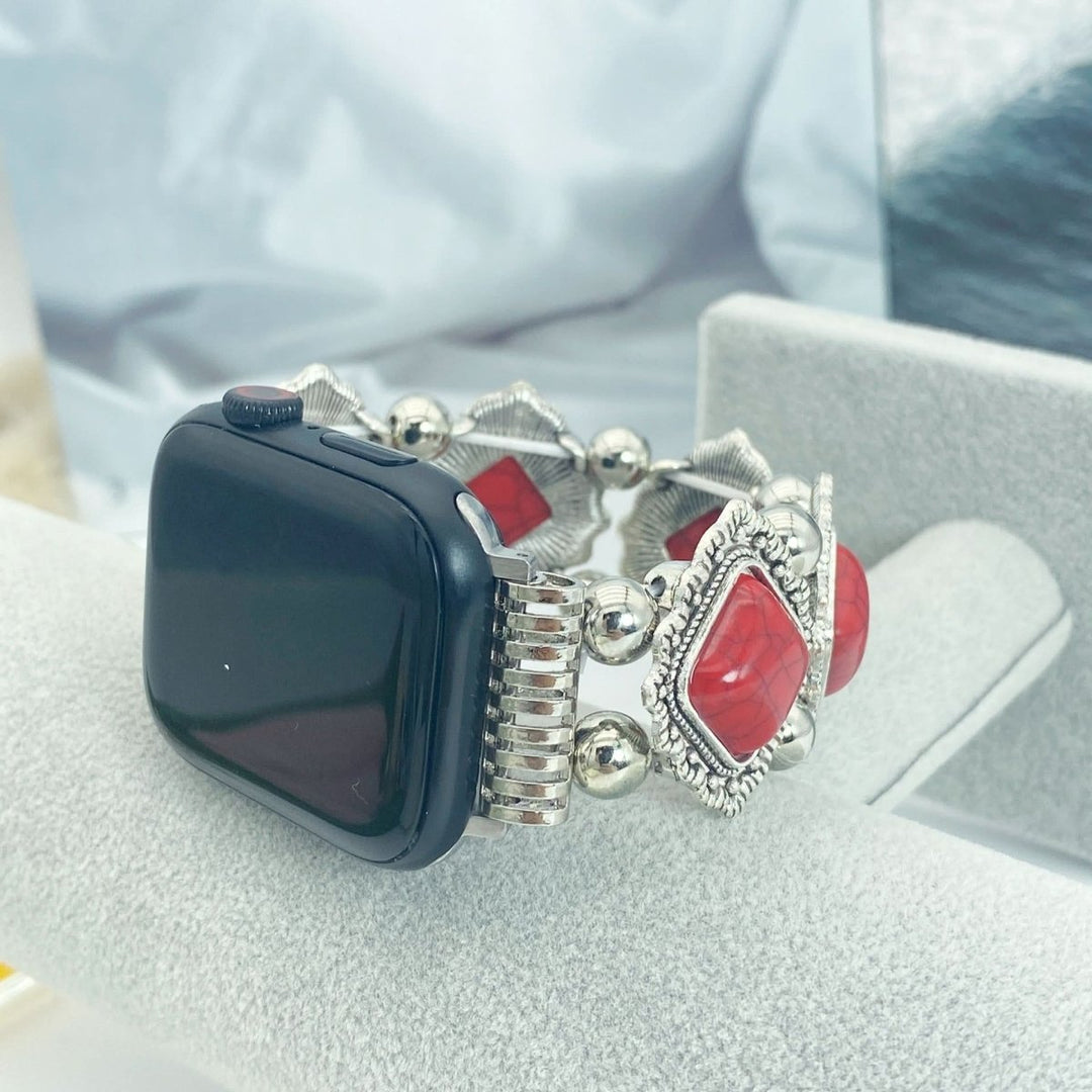 Stylisches Textil-Smartwatch-Armband im Boho-Look mit schimmerndem Türkis-Stein. Modisches Zubehör für Frauen.