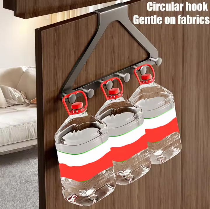 Dreieckiger Garderobenhaken zum Kleben. Perfekte, bohrfreie Lösung für Ordnung von Mänteln und Taschen an der Wand.