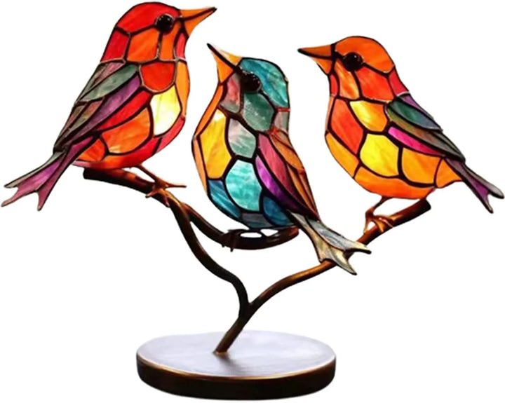 Stilvolle bunte Vogel Skulptur als Wohnaccessoire. Farbenfrohes Kunstwerk aus Kunstharz.