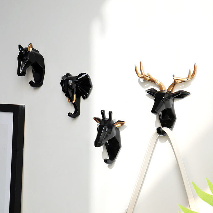 Detailreicher Wandhaken mit Tierkopf-Design, aus handgeschnitztem Harz, individuelles Wohnaccessoire für Ihre Wand.
