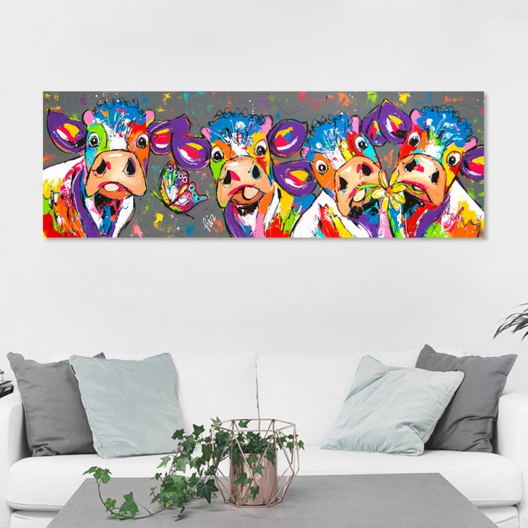 Farbenfrohes Leinwandbild mit bunten Kühen, lebendige Tierkunst als moderne Wanddekoration.