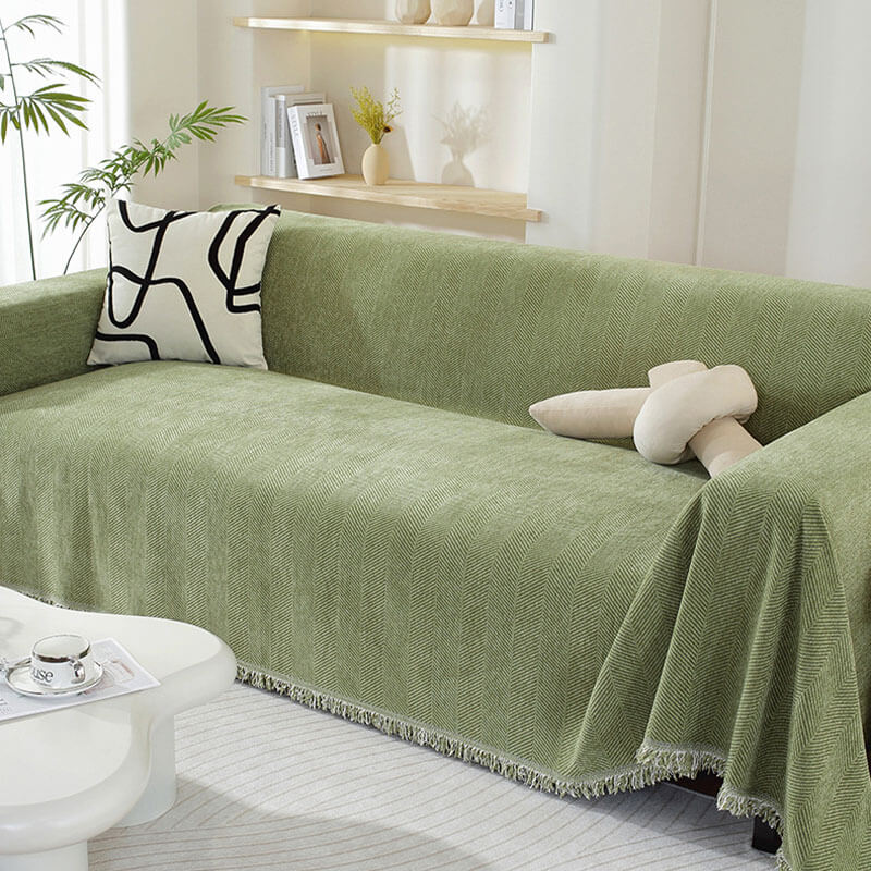 Pflegeleichter Sofabezug aus Chenille, Fischgrätmuster & Quasten, ideal für Wohnzimmer.