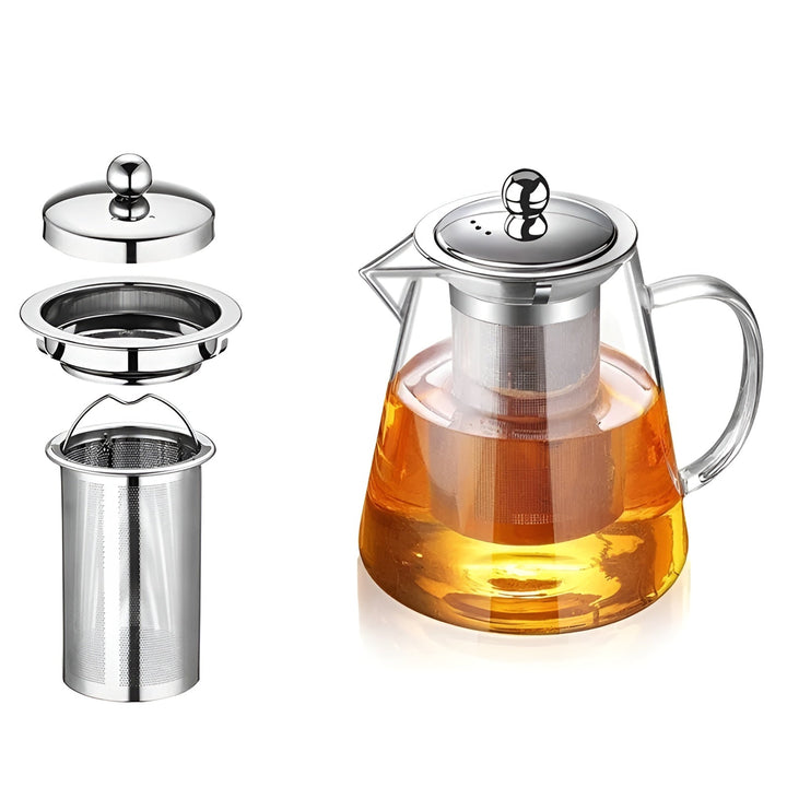 Claritéa Borosilikatglas Teekanne mit Edelstahlfilter, Holzdeckel und losem Tee, minimalistisches Design.