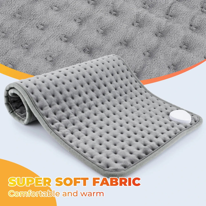 Weiches, graues CosiTherm Heizkissen mit Timer-Funktion für sichere, angenehme Wärme im Bett oder auf dem Sofa.