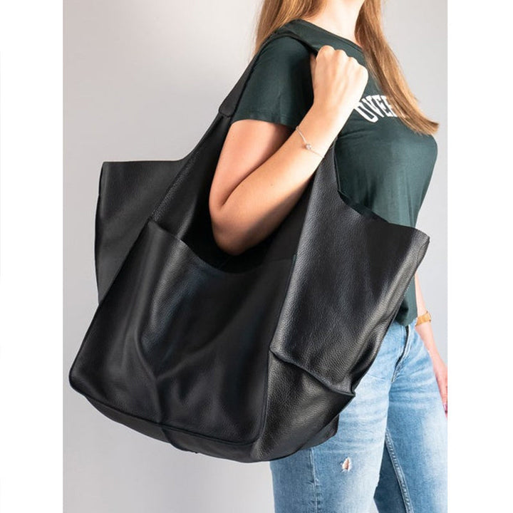 Geschenkidee für Damen: Hochwertiger Leder-Weekender; elegante Schulter- und Reisetasche.