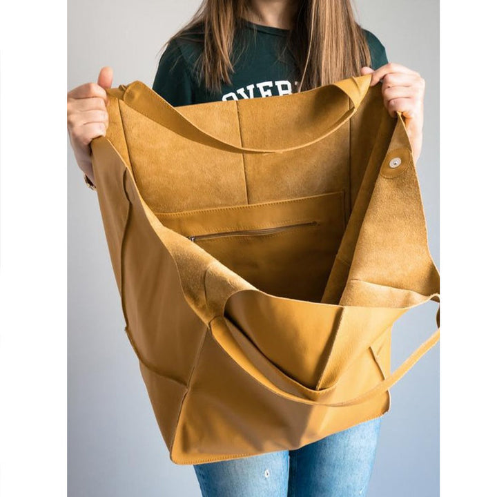 Elegante Damen Leder-Schultertasche, vielseitiger Weekender für Reisen und Alltag.