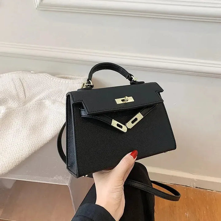 Damen Crossbody Umhängetasche aus PU-Leder in Schwarz, stilvoll & praktisch für Alltag & Freizeit.