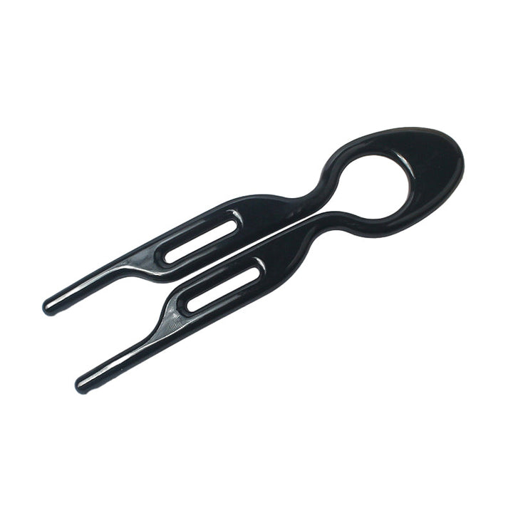 Haarspange mit ergonomischem Design für müheloses Haarstyling und sicheren Halt der Hochsteckfrisur.