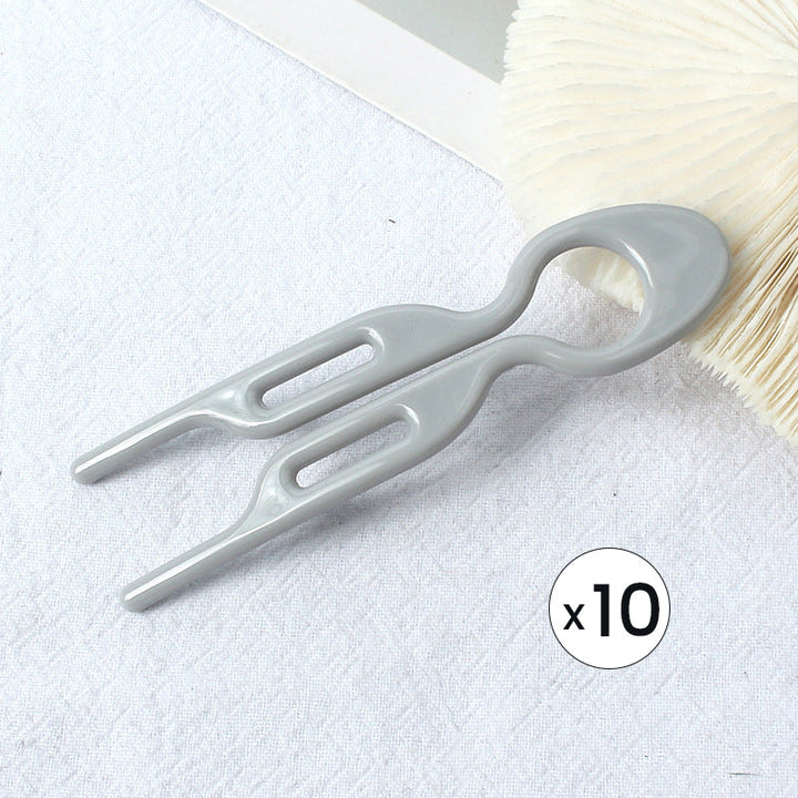 Die GlamGrip Haarspange – der perfekte Haarschmuck, der mühelose Eleganz und festen Halt vereint.