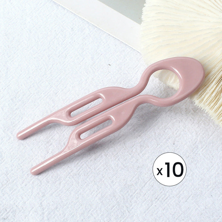 Perfekter Grip: Die GlamGrip Haarspange sichert Ihre Hochsteckfrisur, ohne das Haar zu beschädigen.