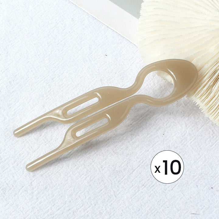 Elegantes Haarstyling mit der GlamGrip Haarspange, ideal für Hochsteckfrisuren und halboffene Frisuren.