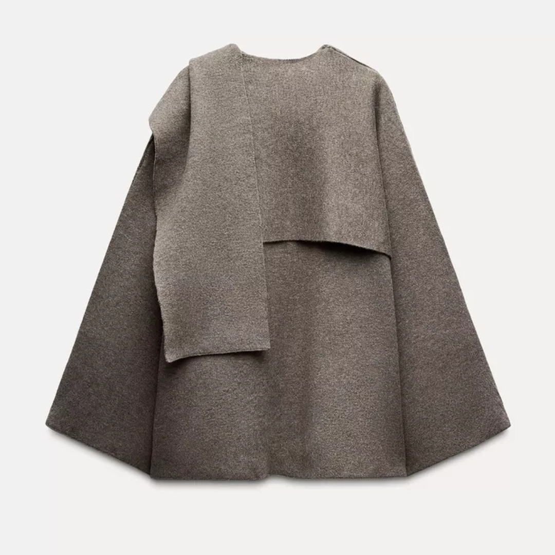 Asymmetrischer Damen Poncho, elegant und warm. Perfektes Mode-Statement für Herbst-Winter.