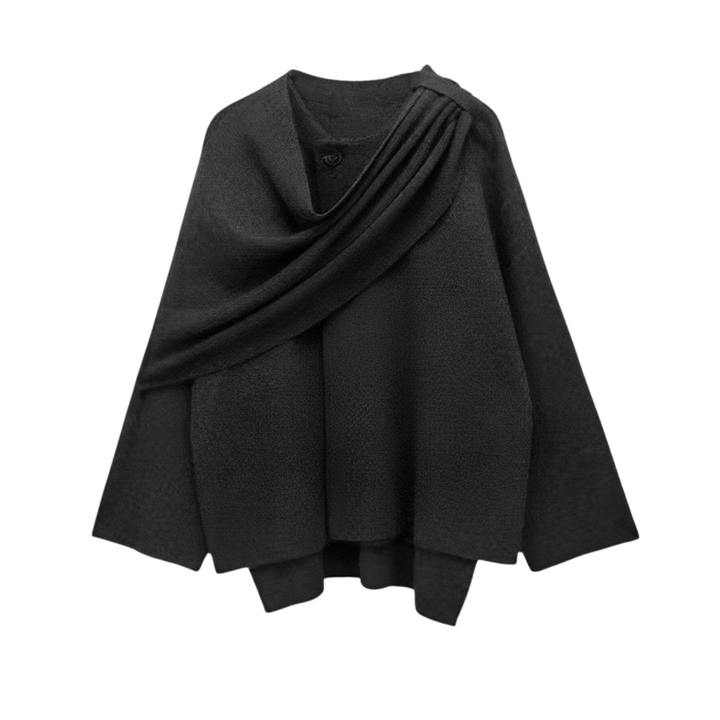 Eleganter Damen Herbstponcho mit asymmetrischem Saum. Warm & bequem, ideal für die kalte Jahreszeit.