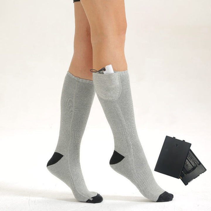 Nahaufnahme der ThermoLuxe Heizelemente in den beheizten Socken für maximale Fußwärme.