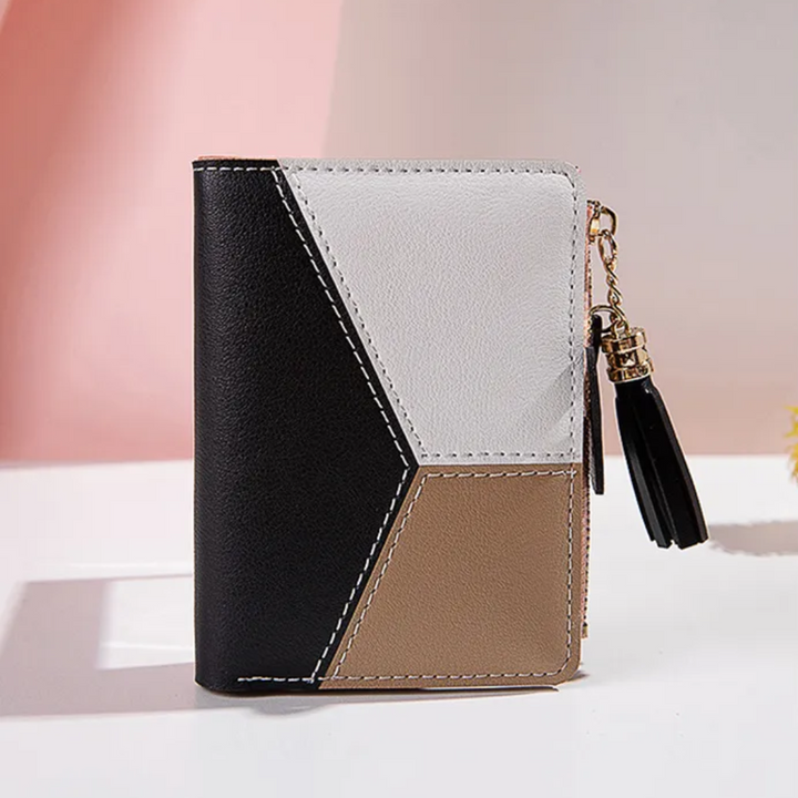 Elegante Damen Faltbrieftasche mit Quaste & praktischem Reißverschluss; ein modernes, kompaktes Accessoire.