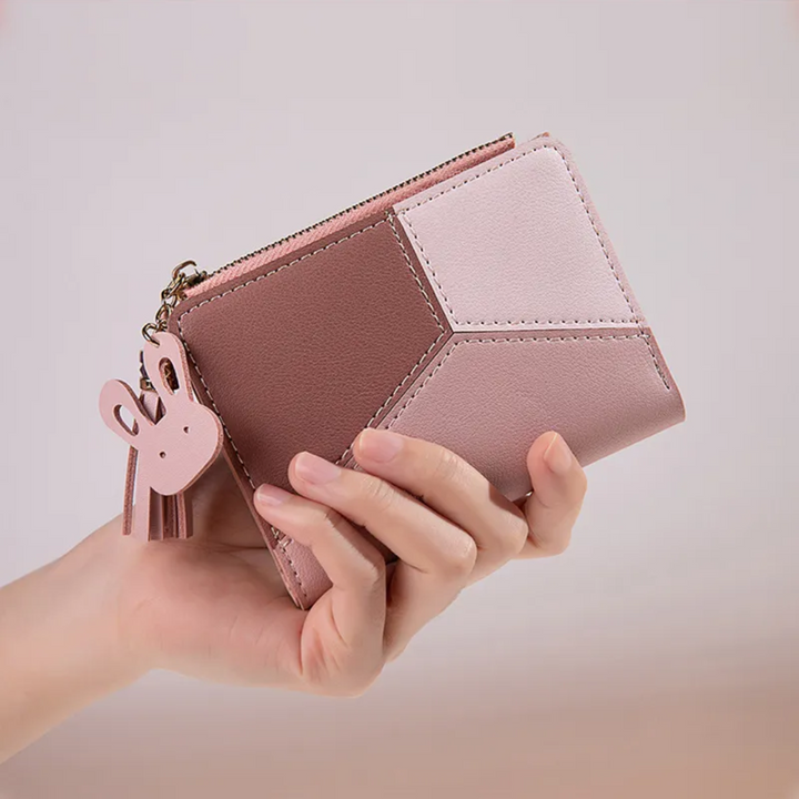 Moderne kurze Damen Geldbörse in trendigem Design mit Quaste; ein stilvolles Alltags-Accessoire.