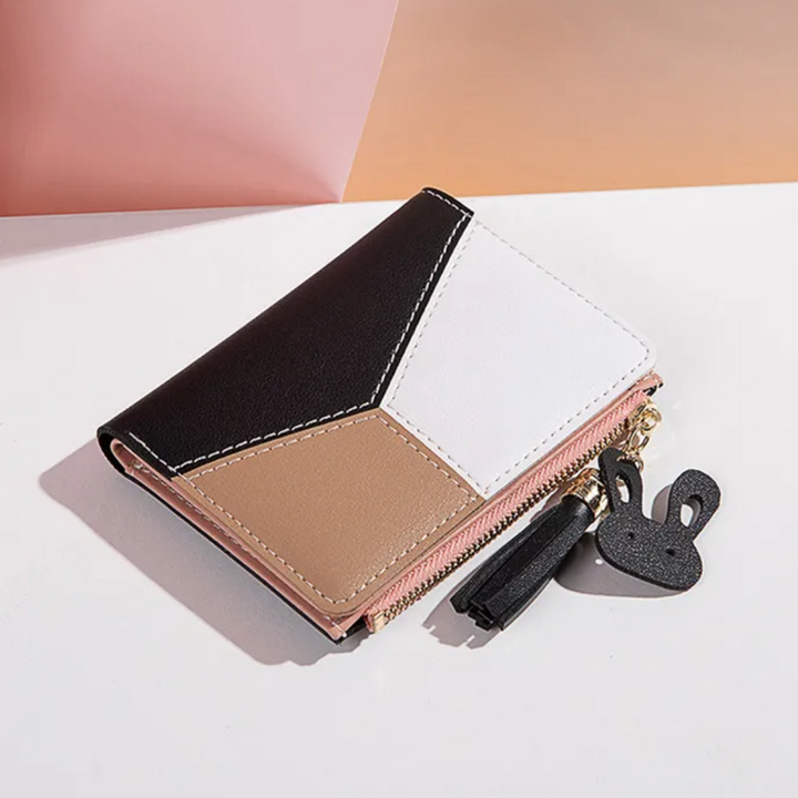 Geschenkidee für Frauen: elegante kurze Geldbörse mit Quaste, modern & funktional.