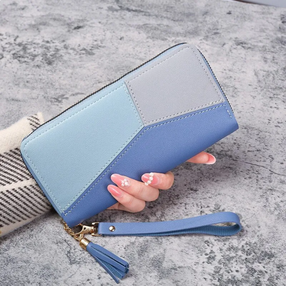 Schwarze Damen Geldbörse, lang, mit geometrischem Design und eleganter Quaste. Praktisches Mode-Accessoire.
